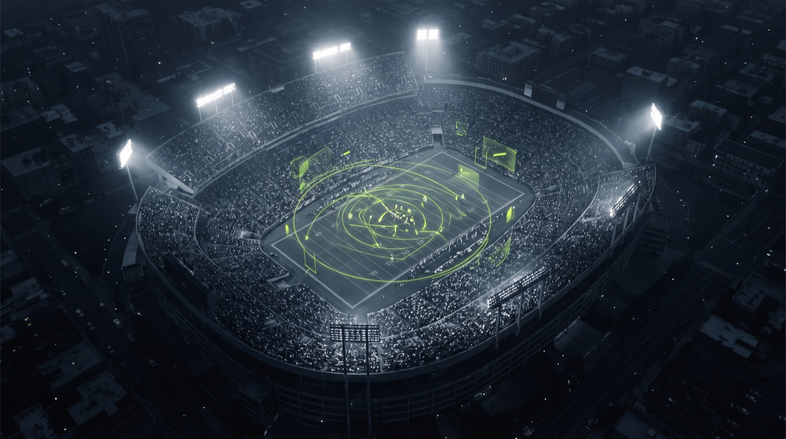 Stadium under lights with live data overlays
